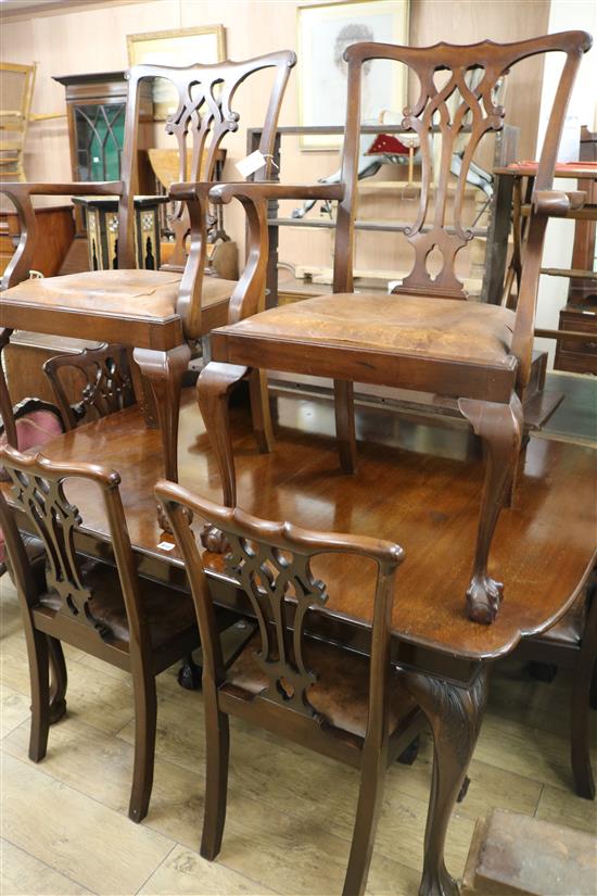 A Chippendale style mahogany extending dining table and a set of six Chippendale style mahogany chairs (two with arms) Table 108cm wide